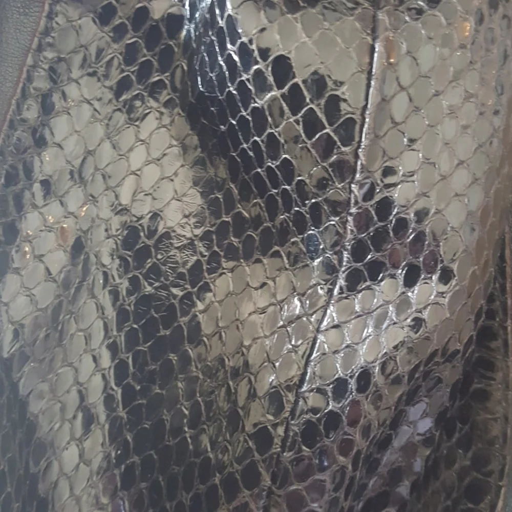 Kate Spade leather snake embossed drawstring hobo bag
